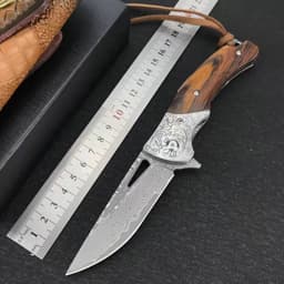 image-Floral Damascus Steel Cowhide Carved Holster Outdoor