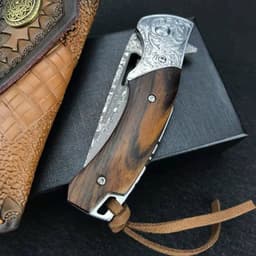 image-Floral Damascus Steel Cowhide Carved Holster Outdoor