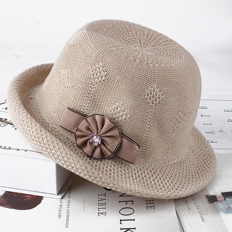 image-Women'S Hats Korean Version Of The Fashion Alice Along The Flower Knitted Women'S Hats Sun Hats