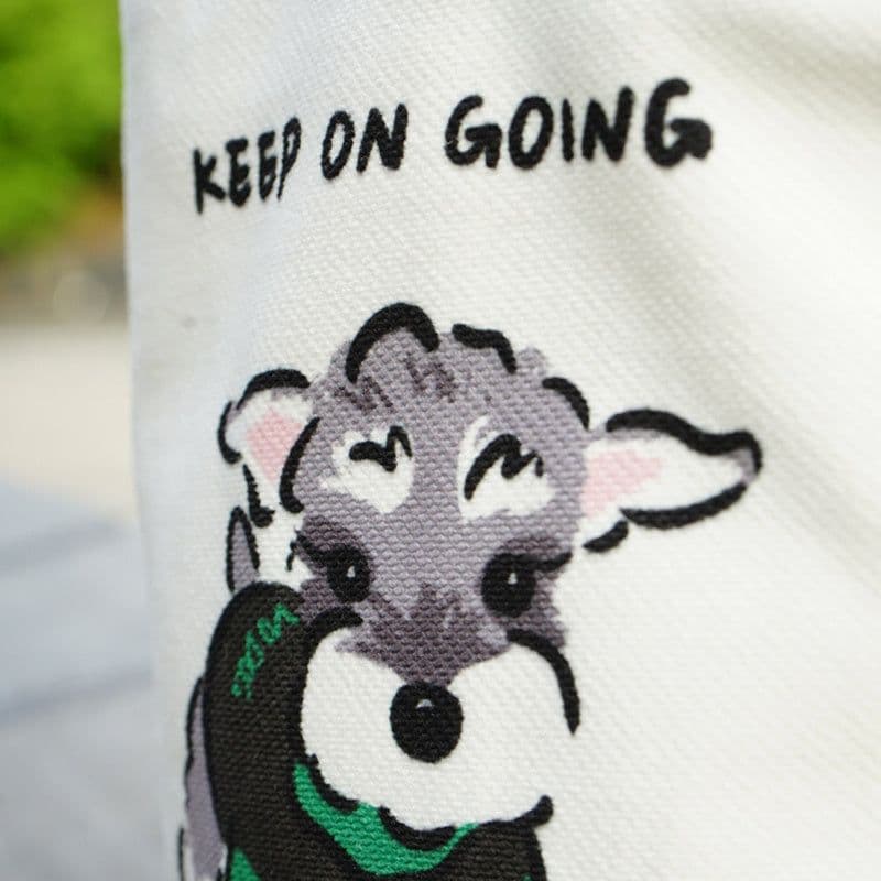 image-Schnauzer Canvas Bag Holding Bucket