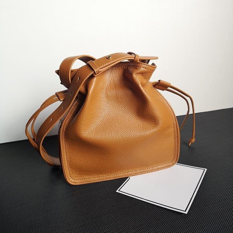 image-One-shoulder Crossbody First Layer Cowhide Pull-belt Bucket Bag
