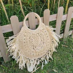 image-Hollow Straw Tassel Handbag