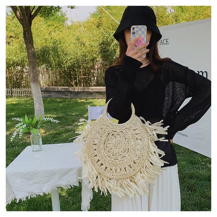image-Hollow Straw Tassel Handbag