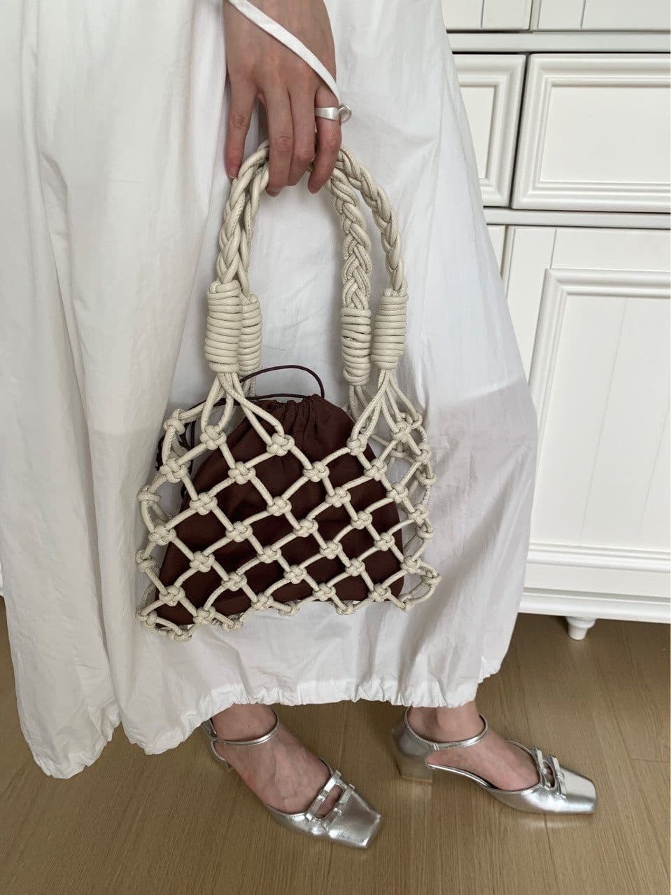image-Pu Hand-woven Bag Hollow Portable Shoulder Underarm Bag
