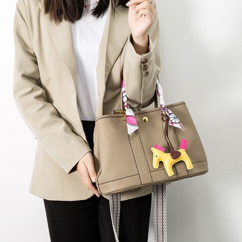 image-Large Capacity Wide Shoulder Strap Cross Body Bucket Bag