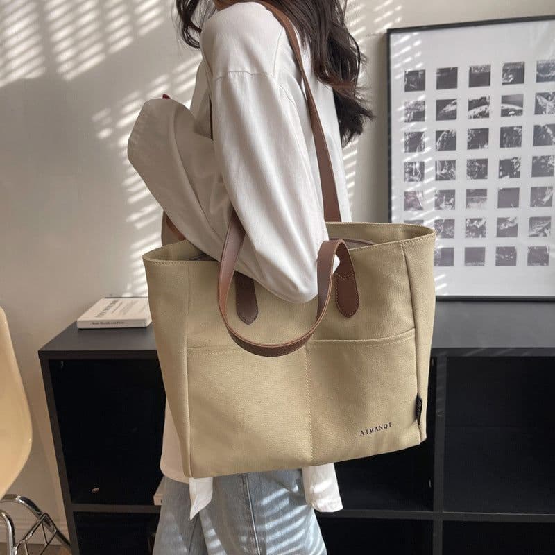 image-Large Capacity Handbag Canvas Texture Niche Shoulder Tote Bag