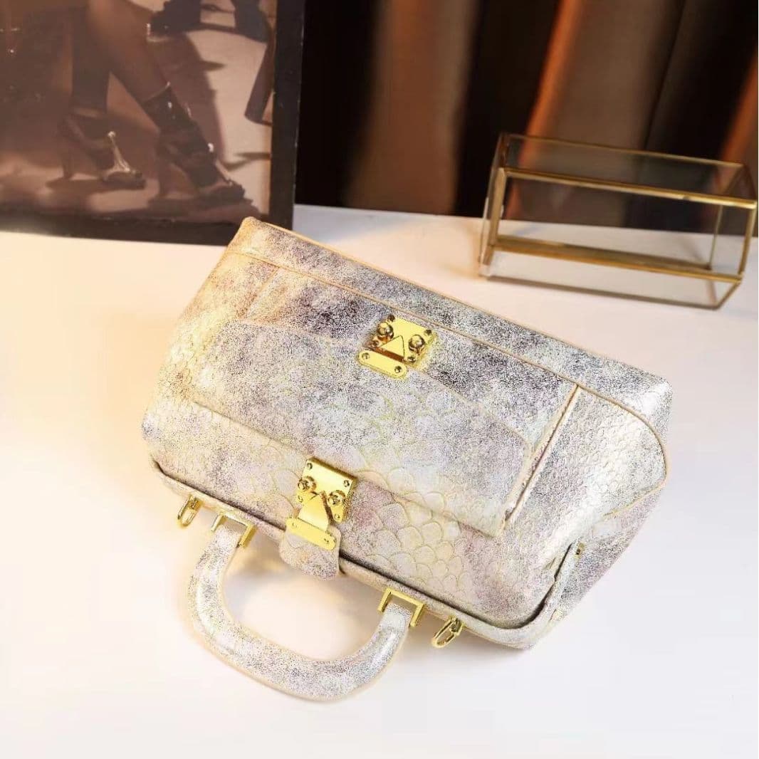 image-Retro Snakeskin Pattern Dumpling Bag Women