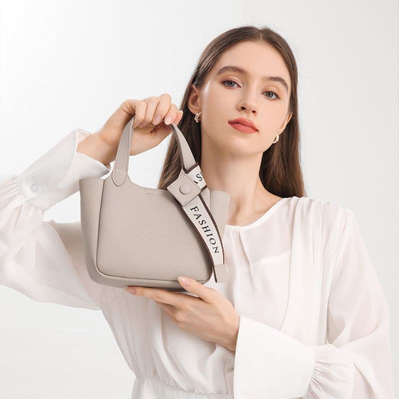 image-Cross-border Genuine Leather Hand Holding Bucket Bag High-grade Simple Shoulder Messenger Bag