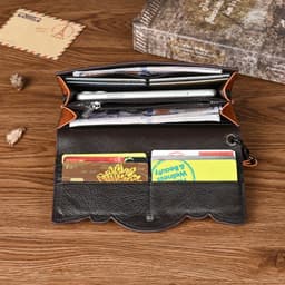image-Chinese Style Embossed Wallet Women's First Layer Long Cowhide Fashion Wallet Large Capacity Tri-fold Bag Retro Wallet
