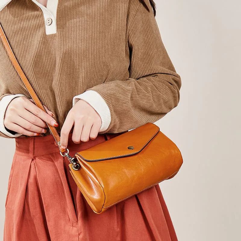 image-High-grade First Layer Cowhide With More Than Handmade Bag Compartments