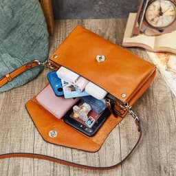 image-High-grade First Layer Cowhide With More Than Handmade Bag Compartments