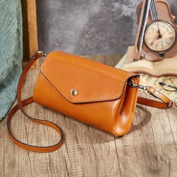 image-High-grade First Layer Cowhide With More Than Handmade Bag Compartments