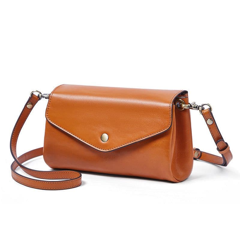 image-High-grade First Layer Cowhide With More Than Handmade Bag Compartments