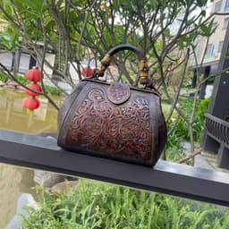 image-Women's Fashion Retro Clip Leather Carving Shoulder Messenger Bag