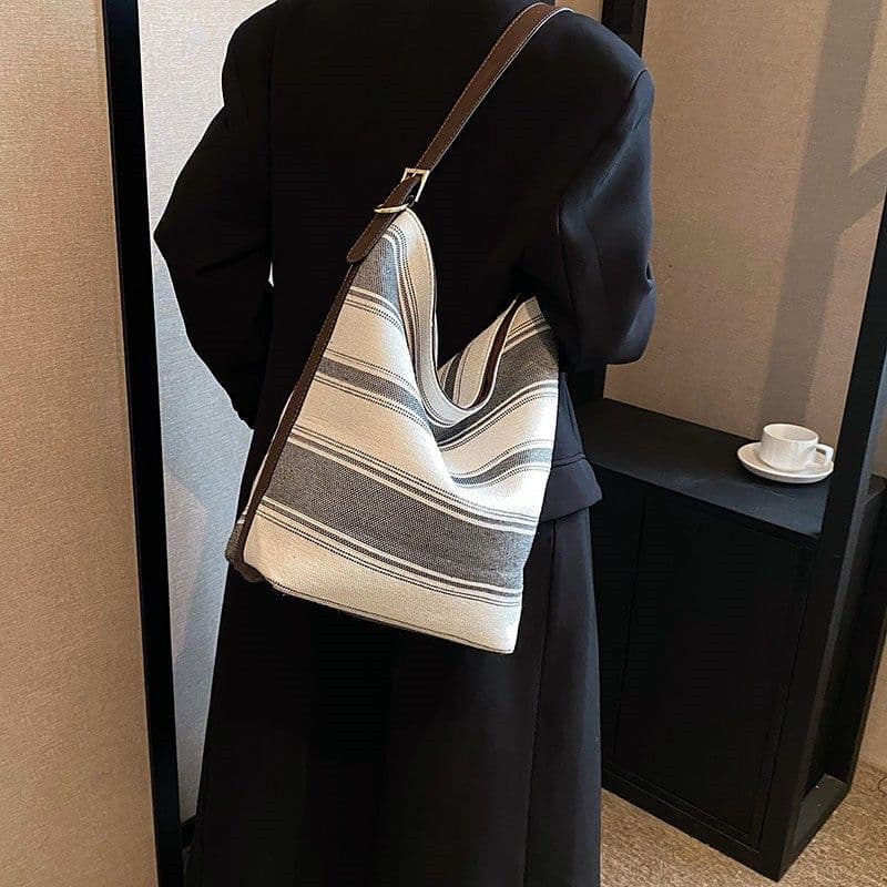 image-Artistic Striped Hand-carrying Bucket Bag For Women