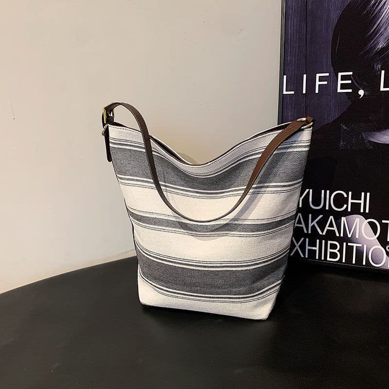 image-Artistic Striped Hand-carrying Bucket Bag For Women