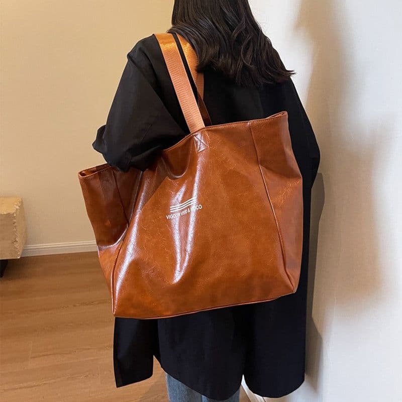 image-Large Capacity Tote Bag Women Fashion Versatile Solid Shoulder Bags Waterproof Designer Luxury Handbag Trend Personalized Travel Bag
