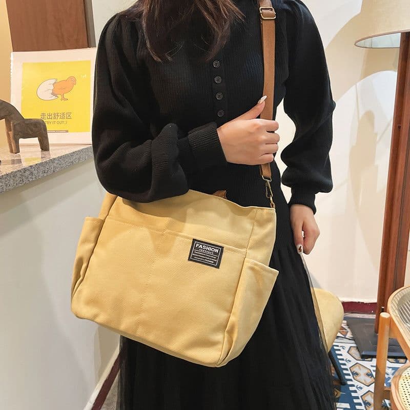 image-New Women's Canvas Casual Retro Large Capacity Multi-layer Women's Messenger Bag