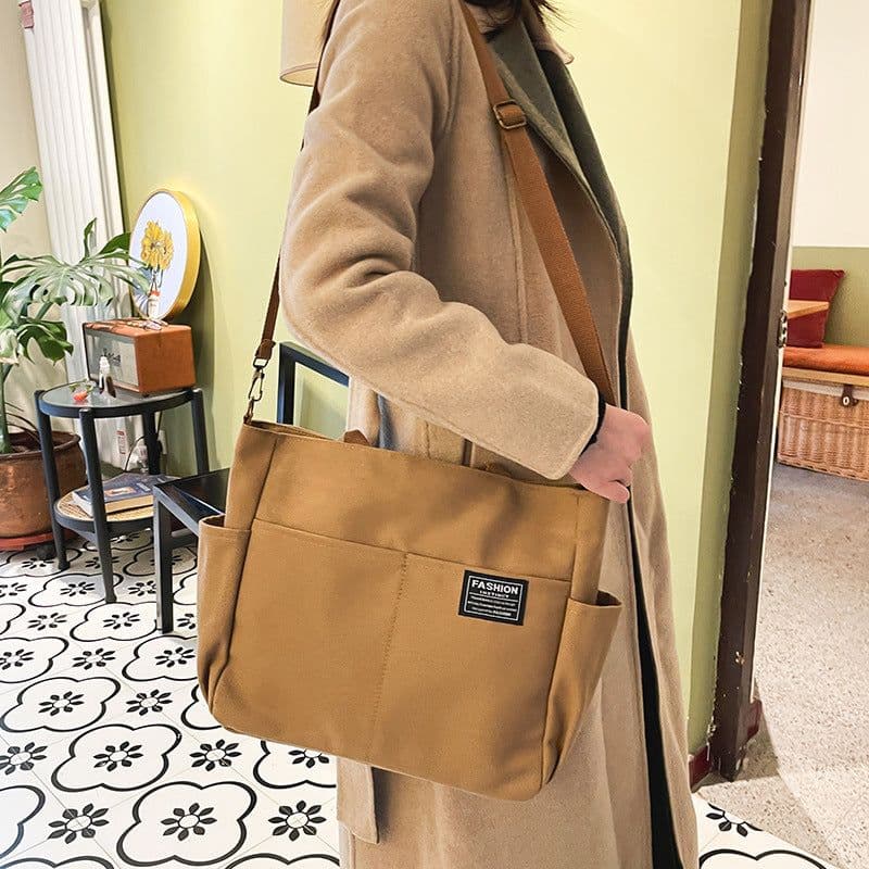 image-New Women's Canvas Casual Retro Large Capacity Multi-layer Women's Messenger Bag