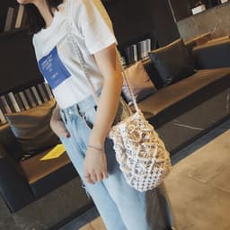 image-Women's Round Diagonal Cotton Crochet Tassel Small Bag