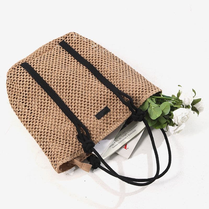 image-Simple Large Capacity One Shoulder Hollow Out Woven Bag