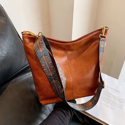 image-Retro Shoulder Messenger Bag Large Capacity Commuter Women's Bucket Bag