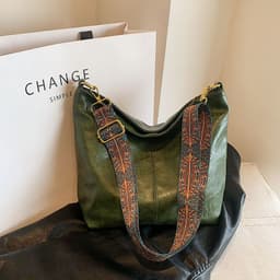 image-Retro Shoulder Messenger Bag Large Capacity Commuter Women's Bucket Bag
