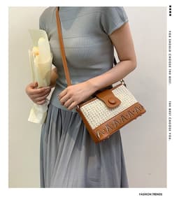 image-Summer Fashion Woven Female Niche Korean Style Advanced Texture Letters Hollow Shoulder Bag