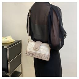 image-Summer Fashion Woven Female Niche Korean Style Advanced Texture Letters Hollow Shoulder Bag