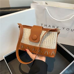 image-Summer Fashion Woven Female Niche Korean Style Advanced Texture Letters Hollow Shoulder Bag