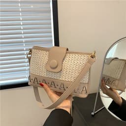 image-Summer Fashion Woven Female Niche Korean Style Advanced Texture Letters Hollow Shoulder Bag