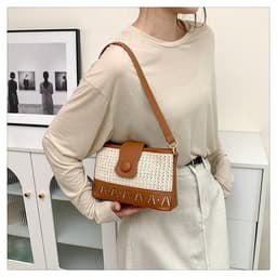 image-Summer Fashion Woven Female Niche Korean Style Advanced Texture Letters Hollow Shoulder Bag