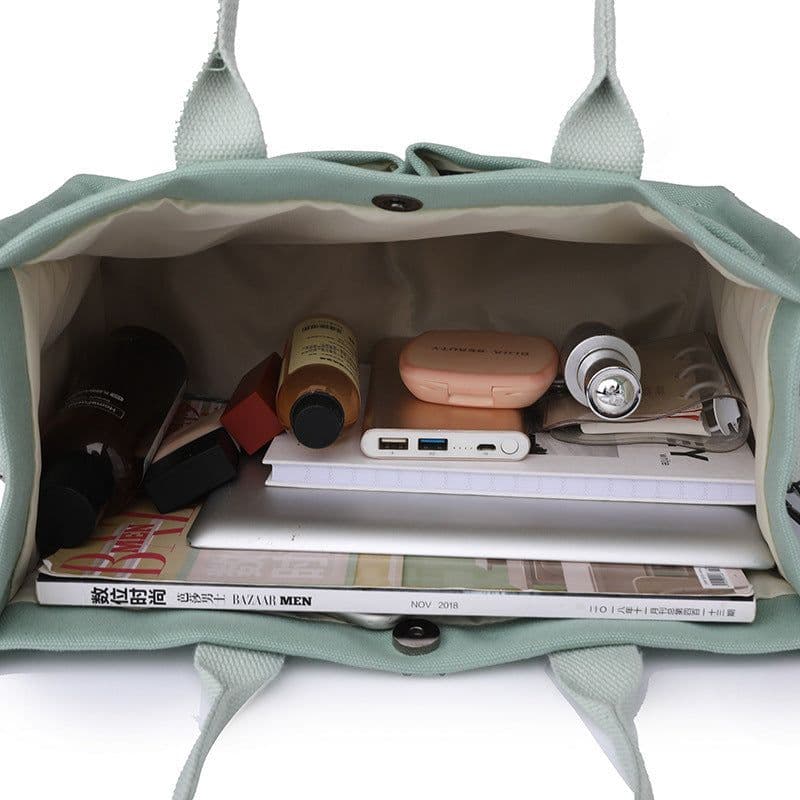 image-New Canvas Shoulder Bag Women Large Capacity Multi-pocket Handbags Casual Crossbody Shopper Bags For Students
