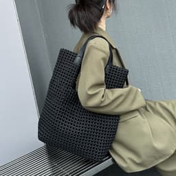 image-Light Luxury Hand-woven Bag Silk Satin Windmill Knot Hollow Special-interest Design