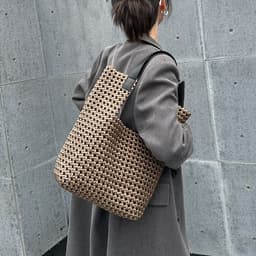 image-Light Luxury Hand-woven Bag Silk Satin Windmill Knot Hollow Special-interest Design