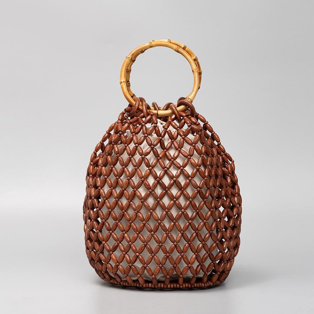 image-Women's Woven Hollow Bucket Bag Niche
