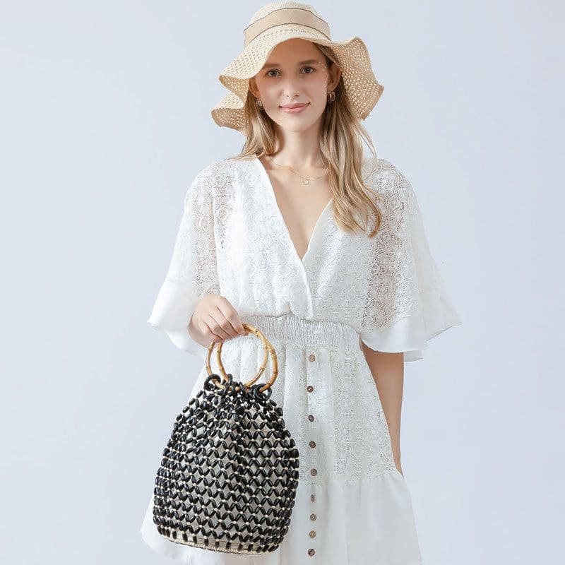 image-Women's Woven Hollow Bucket Bag Niche