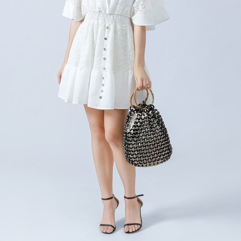 image-Women's Woven Hollow Bucket Bag Niche