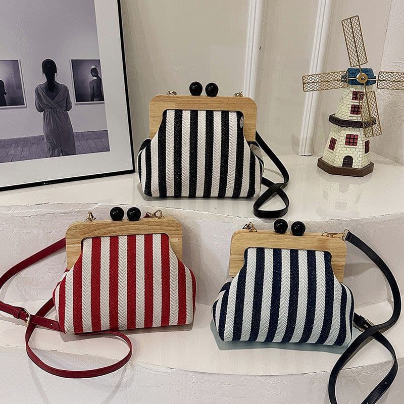 image-New Striped Canvas Wooden Clip-mouth Clutch