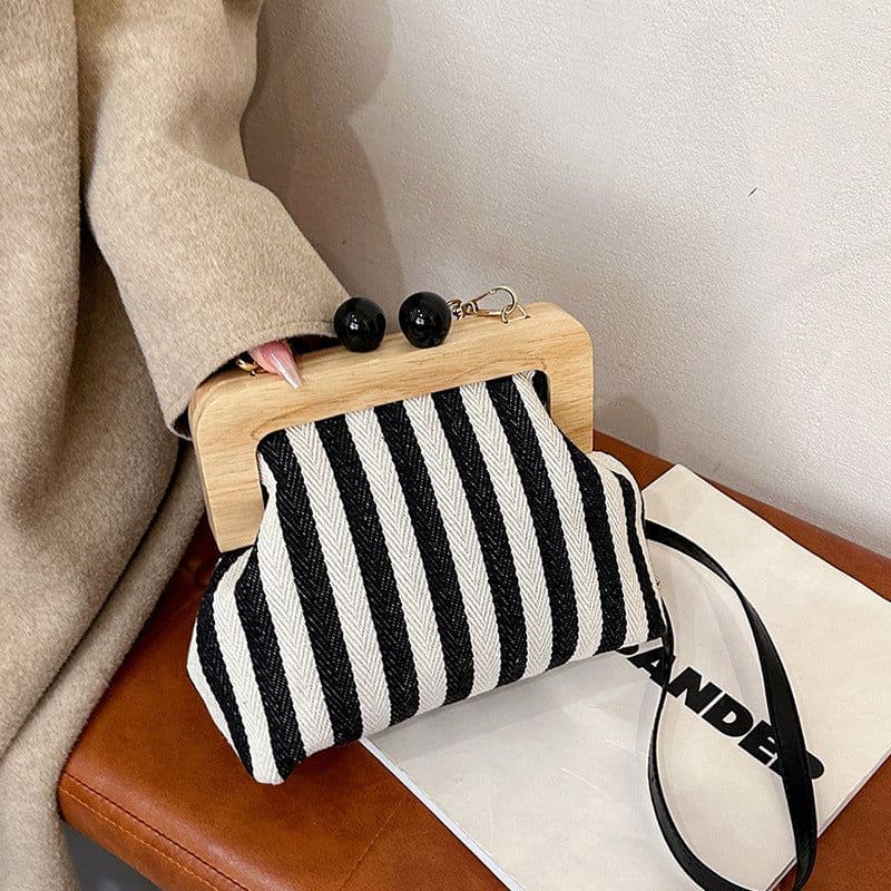 image-New Striped Canvas Wooden Clip-mouth Clutch