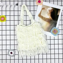 image-European And American Handmade Solid Color Tassel Bag Ethnic Style