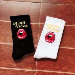 image-Trend INS hip hop socks Europe and the United States street fashion skateboarding couple long socks female male letters lip socks