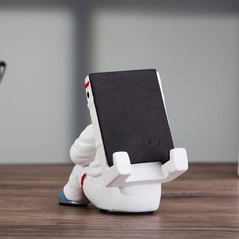 image-Simple Astronaut Mobile Phone Stand Student Desktop Holder Cute Spaceman Cell Phone Holder Creative Gift Small Desk Decoration