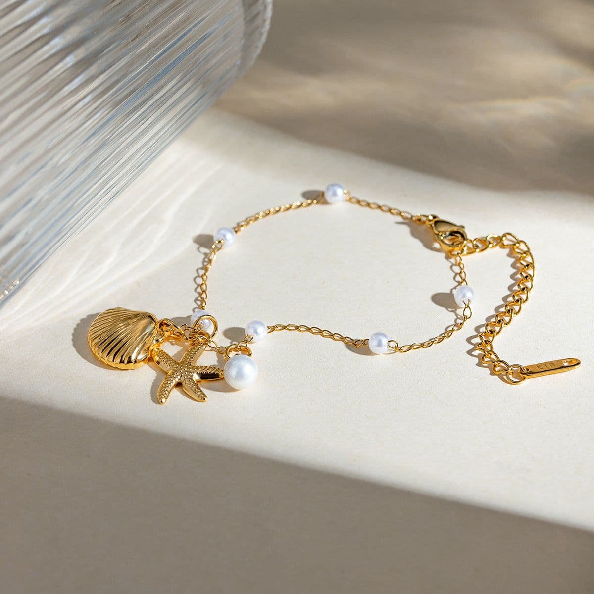 image-Fashion Jewelry 18K Gold Stainless Steel Pearl Chain Summer Holiday Shell Starfish Pendant Bracelet