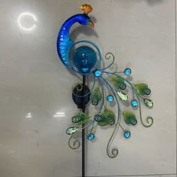 image-Solar Peacock Lamp And Plug Light Wrought Iron Solar Hollow Peacock Rain Gauge Peacock Ice