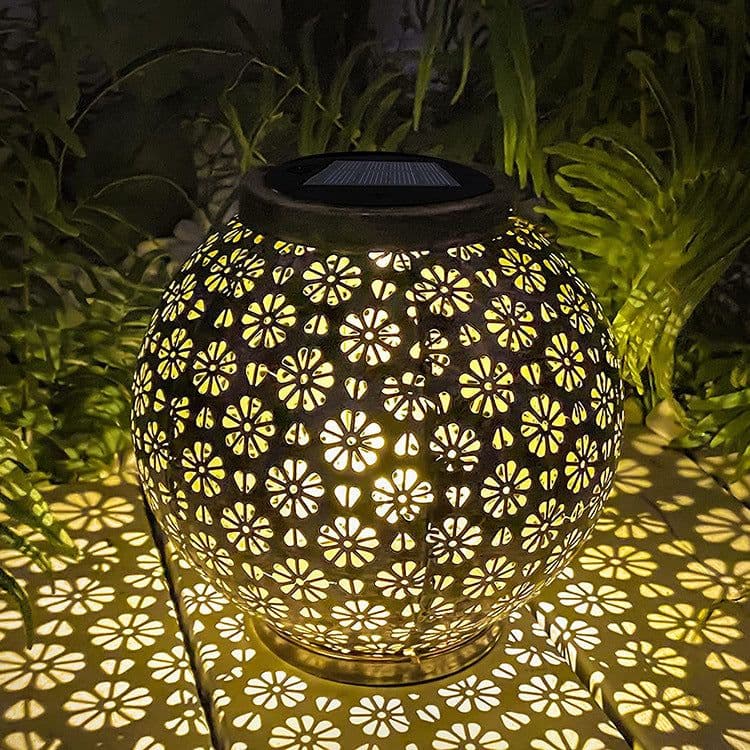 image-Solar Iron Hollow Flower Projection Lamp Outdoor Lawn Decorations