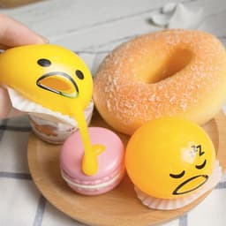 image-Puking Ball Brother Egg Yolk Pinch Vomit Spoof And Play Tricky Toys