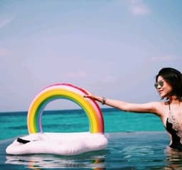 image-Pvc inflatable floating row peacock floating row, inflatable rainbow floating row, inflatable water hammock