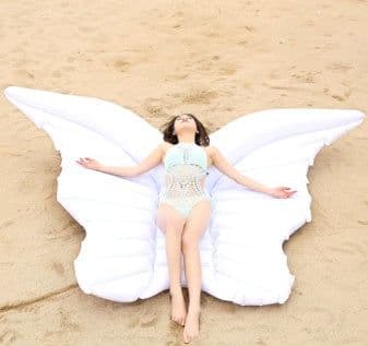 image-Pvc inflatable floating row peacock floating row, inflatable rainbow floating row, inflatable water hammock