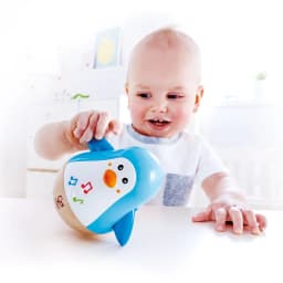 image-Music Penguin Tumbler Toy